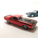 Illustration for article titled AutoWorld vs. Johnny Lightning:1970 Dodge Challengers (T/A vs R/T)